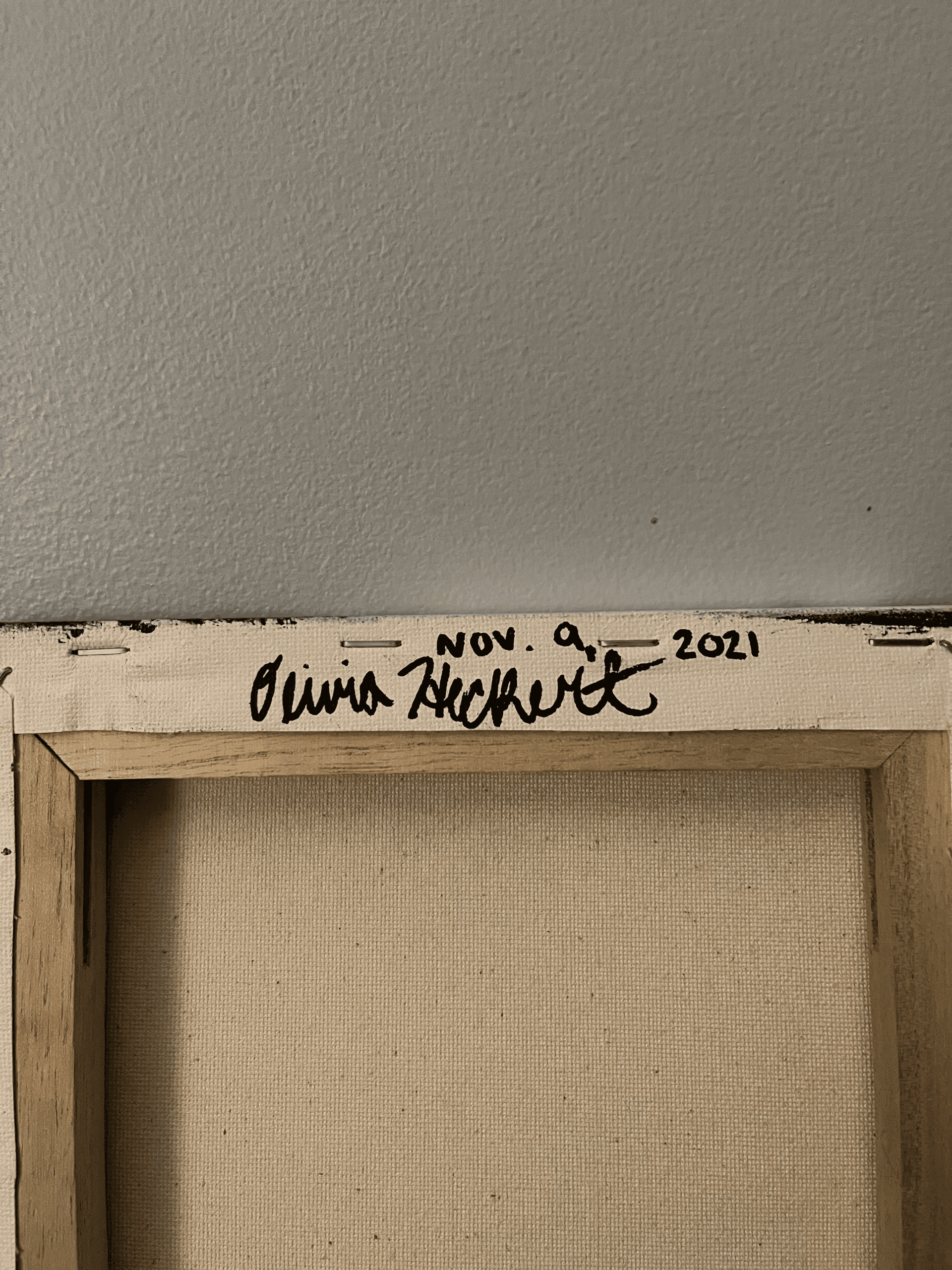 Signature and date on the back of the painting