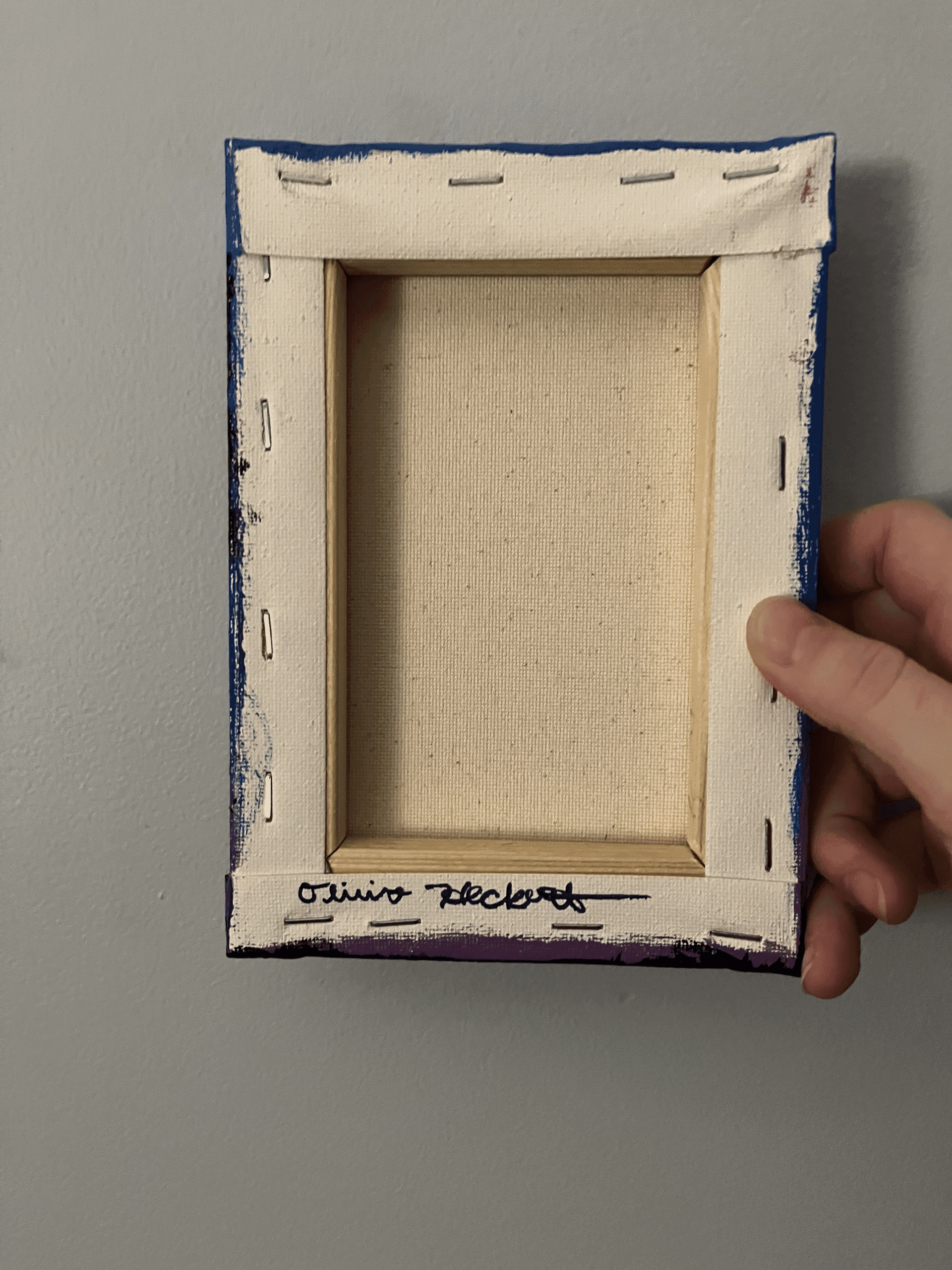 Back of a small acrylic canvas painting signed by the artist